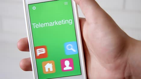 Telemarketing-concept-application-on-the-smartphone.-Man-uses-mobile-app.