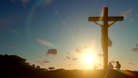 Christians-praying-at-Jesus-cross-at-sunrise,-zoom-out