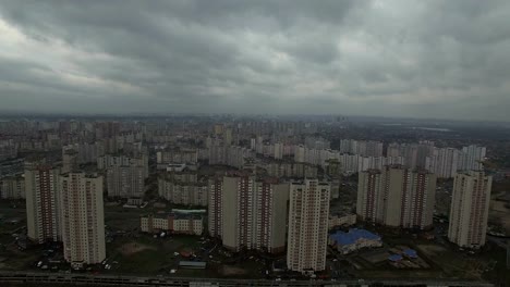 Aerial-drone-footage-of-gray-dystopian-urban-area-with-identical-houses