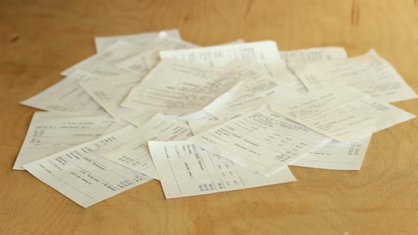 Woman-Sorting-Receipts.-Track-Spending