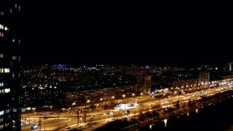 The-beautiful-view-on-the-night-city-with-a-traffic.-time-lapse