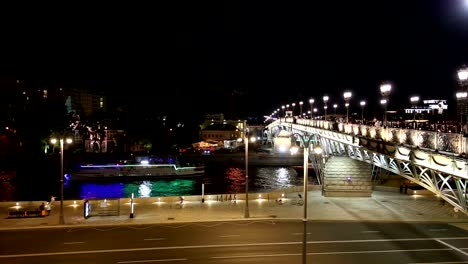 Patriarshy-Bridge---is-a-steel-pedestrian-box-girder-bridge-that-spans-Moskva-River-near-the-Cathedral-of-Christ-the-Saviour-in-downtown-Moscow,-Russia