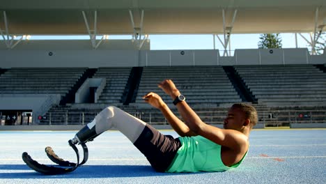 Disabled-athletic-exercising-on-a-running-track-4k