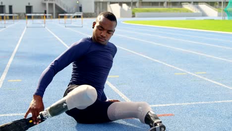 Disabled-athletic-exercising-on-a-running-track-4k