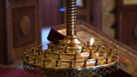 A-small-candle-in-a-Church-candlestick