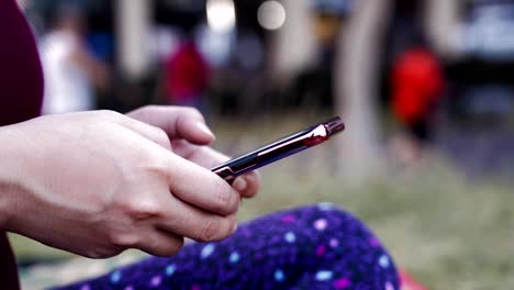 Woman-hand-using-smart-phone-for-social-network