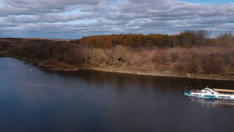 Aerial-view:-Tourist-boat-sails-on-the-Oka-river-near-Ryazan-in-autumn.