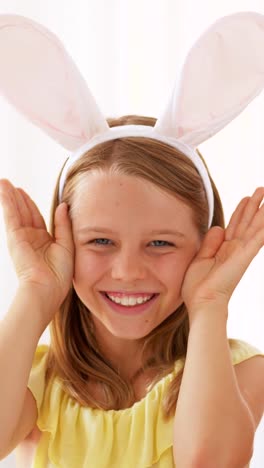 girl-in-easter-bunny-ears-playing-peek-a-boo-game