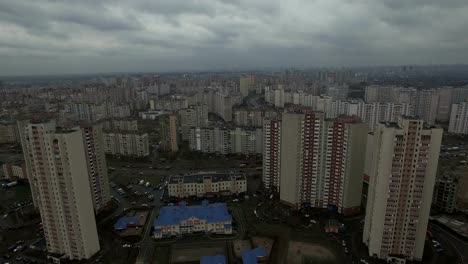 Aerial-drone-footage-of-gray-dystopian-urban-area-with-identical-houses