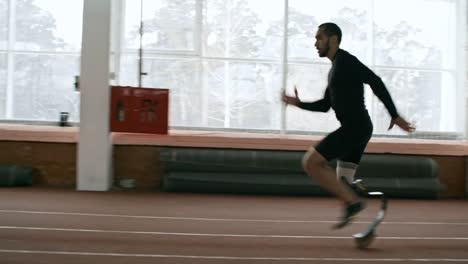 Sportsman-with-Prosthetic-Leg-Sprinting-on-Track