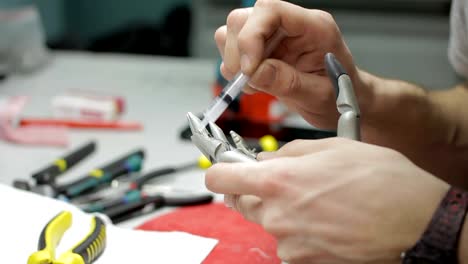 Close-up-of-artificial-hand-limb-is-being-glued-in-the-studio