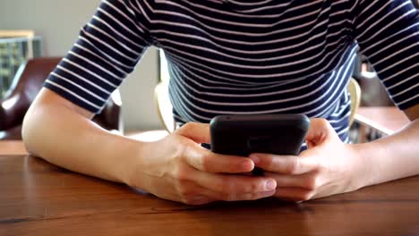 Woman-hand-using-laptop-in-cafe-shop-background.-Business-and-social-network-concept.