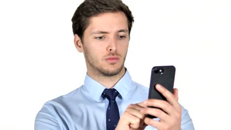 Young-Businessman-Using-Smartphone-on-White-Background