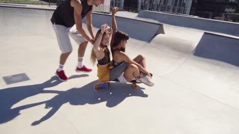 Friends-creating-a-fun-video-at-skateboard-park.