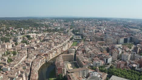 Drone-flight-over-Girona-buildings-and-river-Onyar