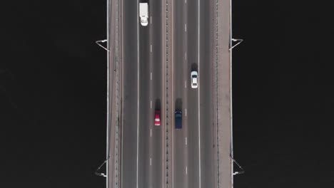 Highway-bridge-traffic-aerial-top-view-high-speed-time-lapse-cars