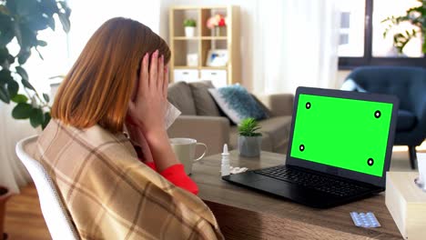 sick-woman-having-video-call-on-laptop-at-home