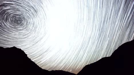 4K-Star-Trails-Night-Sky-Cosmos-Galaxy-Time-lapse-over-plateau-on-Kackar-Mountains,-Turkey.