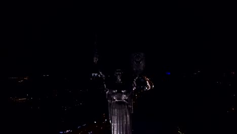 Aerial-View-of-Mother-Motherland-at-the-Night-with-Illuminated-Lights,-the-Monument-is-Located-on-the-Banks-of-Dnieper-River.-Kiev,-Ukraine.-Shot-in-4K-UHD