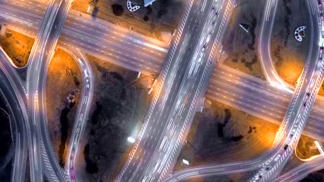 Hyperlapse-timelapse-of-night-city-traffic.-Kiev,-Ukraine.-vertical-aerial-view.