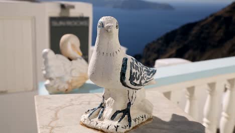 Nice-handmade-bird-figurines-decorating-old-Greek-resort-town,-cultural-heritage