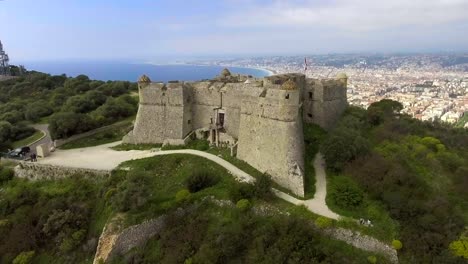 Aerial-view-of-ancient-fortress-of-Menton-situated-on-French-Riviera,-Cote-dAzur