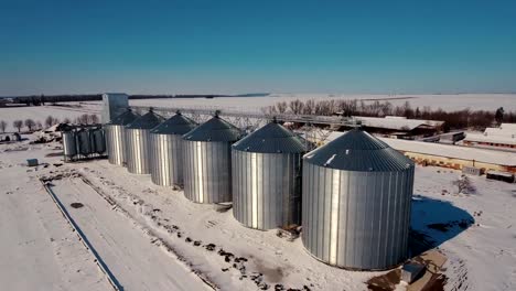 Agriculture-grain-silos-storage-tank.-Large-metal-silos-elevator-and-factory