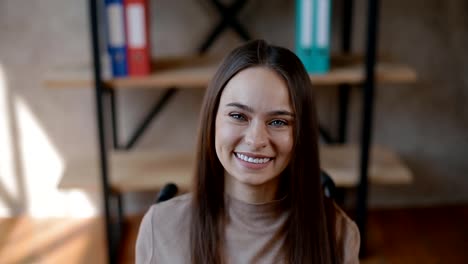 Portrait-of-young-disabled-woman-at-office