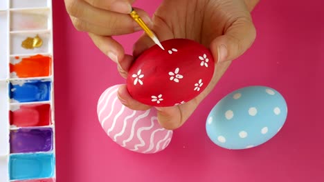 People-painting-colorful-Easter-eggs