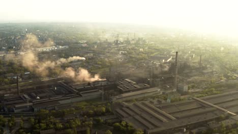 urban-skyline-with-the-smoke-from-the-plant-pipes-above-the-city-buildings