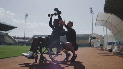 Wheelchaired-man-doing-overhead-presses