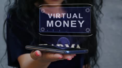 Woman-showing-HUD-hologram-Virtual-money