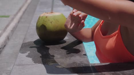 Hands-of-young-female-communicating-by-a-smartwatch-in-a-swimming-pool