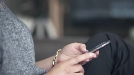 Young-woman-with-mobile.-Surfing-the-internet-concept,social-media.-Young-woman-using-her-smart-phone