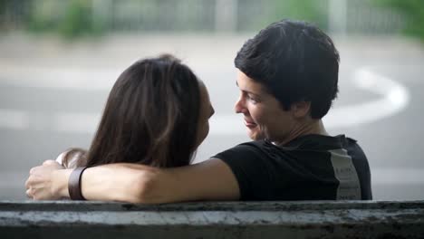 Close-up:-two-lesbians-are-hugs-and-kiss-on-bench