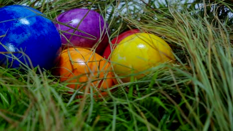 Sliding-over-a-nest-with-Easter-Eggs---close-up-shot