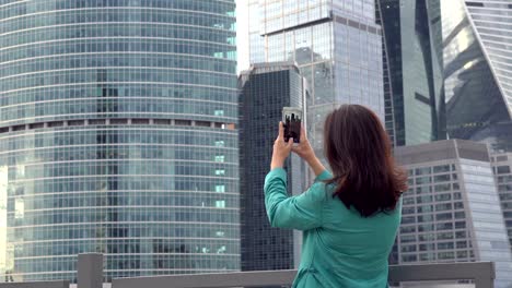 Young-tourist-takes-a-shots-of-business-center