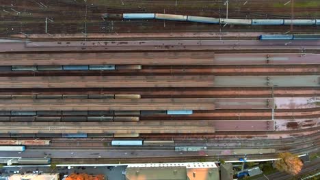 Aerial-view.-Trains-moving-out-from-platform-of-railway-station