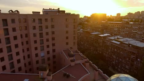 View-of-contrast-between-modern-and-Soviet-buildings,-densely-built-up-area