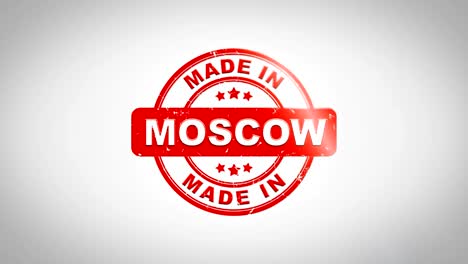 Made-In-MOSCOW-Signed-Stamping-Text-Wooden-Stamp-Animation.-Red-Ink-on-Clean-White-Paper-Surface-Background-with-Green-matte-Background-Included.