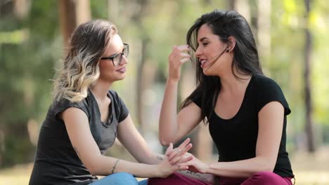 Girlfriends-together-at-the-park-talking