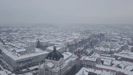 Lviv,-Ukraine.-Arial-shot.-Opera-house.-Christmas-tree.-Christmas-Fair.-People-are-walking-around-the-city-center.-Winter