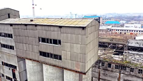 Flight-over-the-empty-old-plant-almost-ruined-in-the-city-after-the-war.