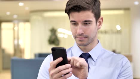 Businessman-Using-Smartphone,-Browsing-Internet