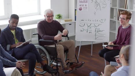 Disabled-Teacher-Talking-to-Students-and-Smiling