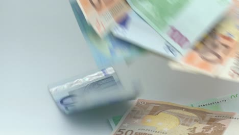 Slow-motion-of-euros-are-flying-and-falling.-Euro-banknotes-different-values