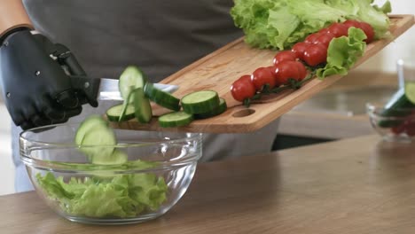 Self-Sufficient-Male-Amputee-with-Bionic-Limb-Making-Salad-at-Home