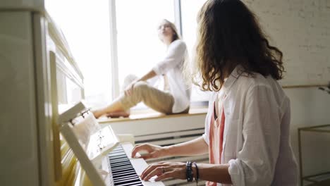 Girlfriends-playing-on-piano