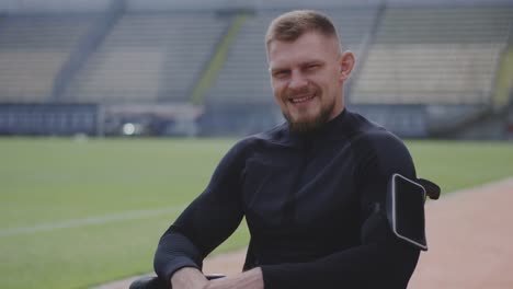 Wheelchaired-athlete-smiling-at-camera