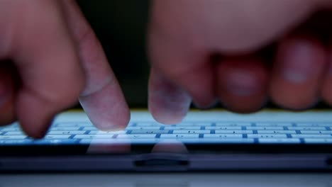 Hands-Typing-On-Virtual-Keyboard-Of-Tablet-Computer.